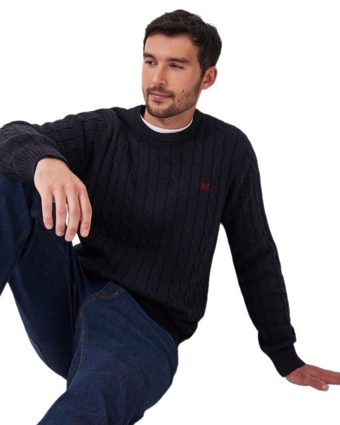Navy Coloured Crew Clothing Mens Oarsman Cable Knit Organic Cotton Crew Neck Jumper on white background #colour_navy