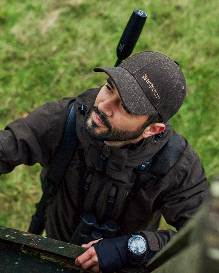 Wood coloured Deerhunter Game Cap on blurry background #colour_wood