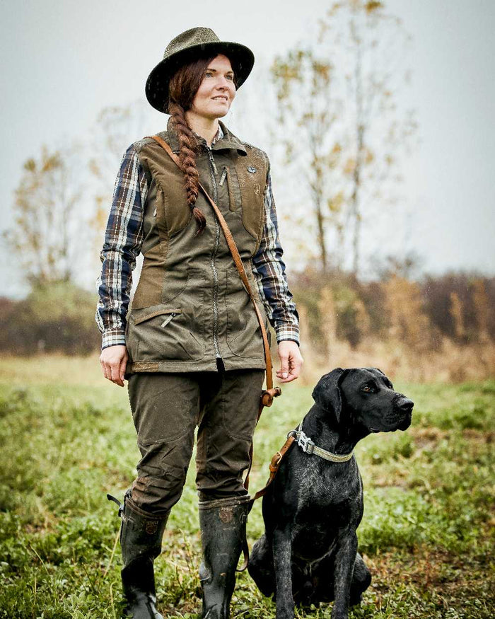 Deep Green coloured Deerhunter Lady Ann Trousers on grass background #colour_deep-green
