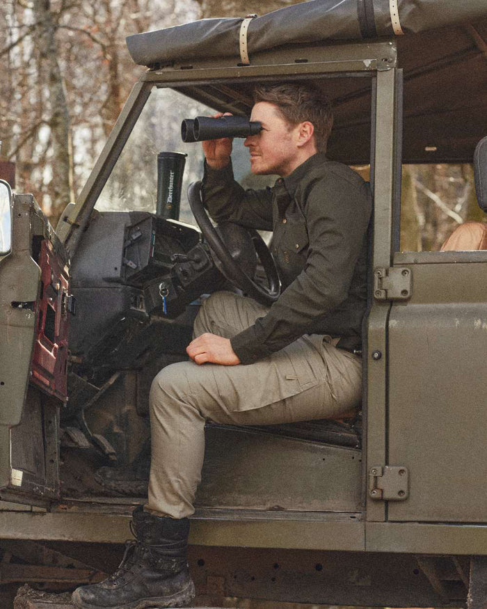 Forest Green coloured Deerhunter Matobo Shirt on jeep background #colour_forest-green