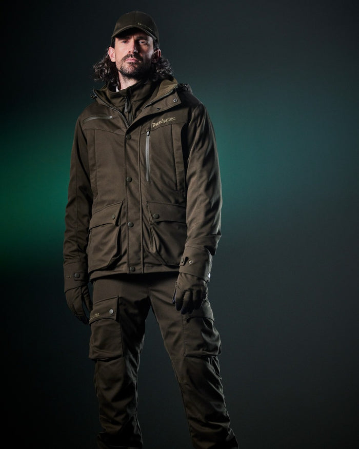 Art Green coloured Deerhunter Mens Muflon Pro Light Jacket on dark background #colour_art-green
