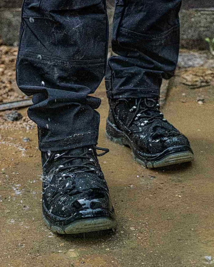 Black Coloured DeWalt Challenger Waterproof Safety Hiker Boots on outdoor background #colour_black