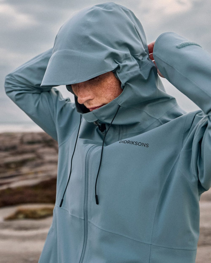 Factory Blue coloured Didriksons Bea Womens Parka 6 on sea background #colour_factory-blue