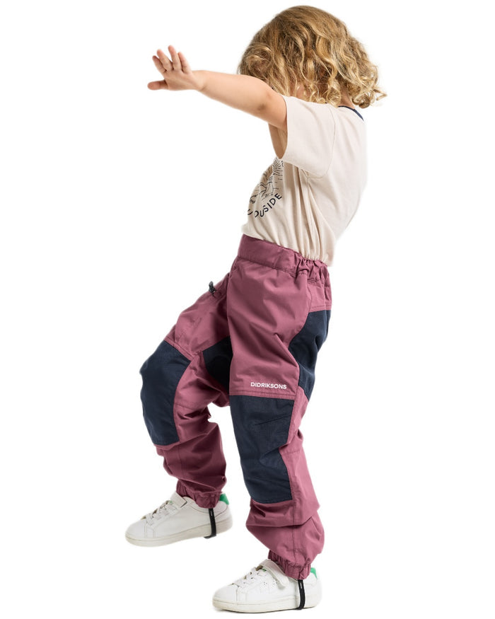 Heather Pink coloured Didriksons Childrens Dusk Pants on white background #colour_heather-pink