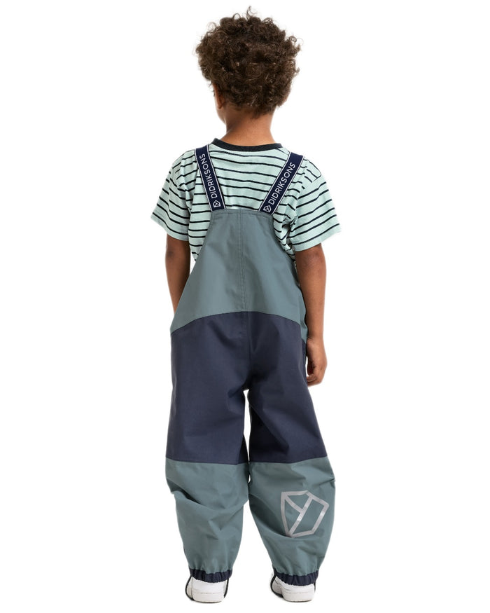 Factory Blue coloured Didriksons Childrens Foxen Bib Pants on white background #colour_factory-blue