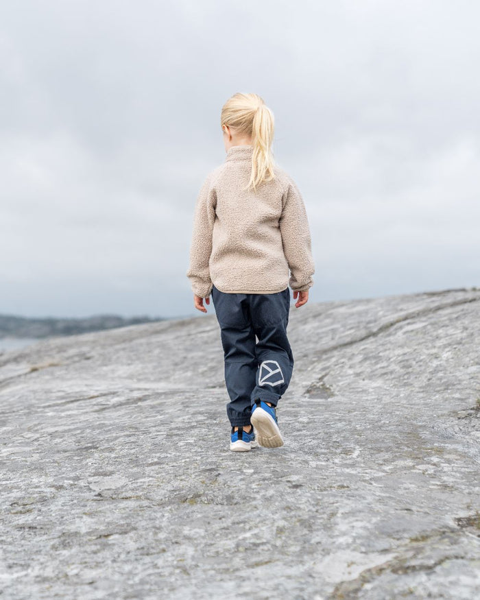 Beach Beige coloured Didriksons Childrens Gibbs Full Zip Jacket 2 on sky background #colour_beach-beige