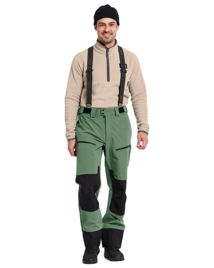 Dark Moss coloured Didriksons Mens Fractus Pants on white background #colour_dark-moss
