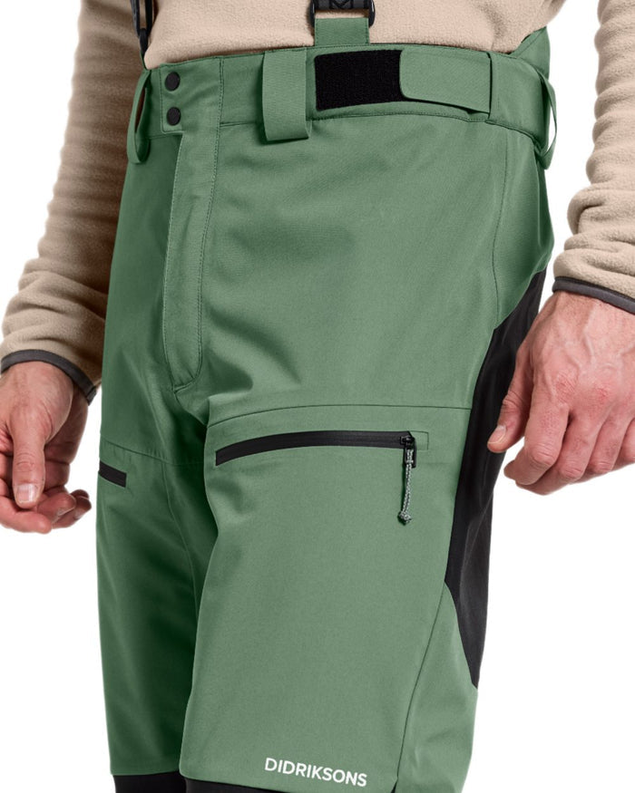Dark Moss coloured Didriksons Mens Fractus Pants on white background #colour_dark-moss