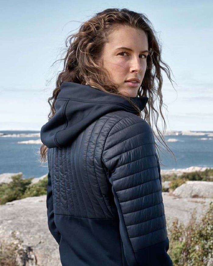 Dark Night Blue coloured Didriksons Womens Annema Full Zip 6 on lake background #colour_dark-night-blue