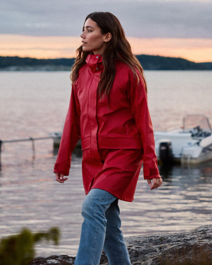 Spring Red Coloured Didriksons Womens Elly Galon Parka on outdoor background #colour_spring-red