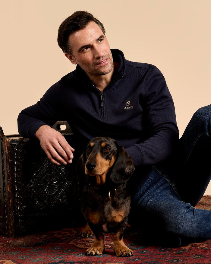 Navy coloured Dubarry Mens Boyce Zip Neck Sweater on indoor background #colour_navy
