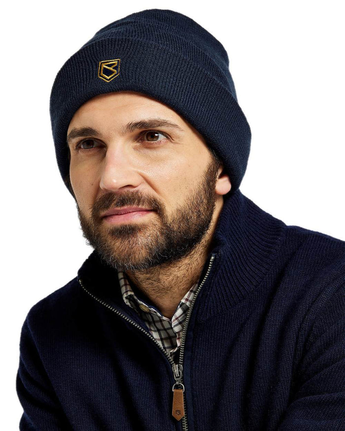 Navy Coloured Dubarry Mens Clonmellon Knitted Beanie on white background #colour_navy
