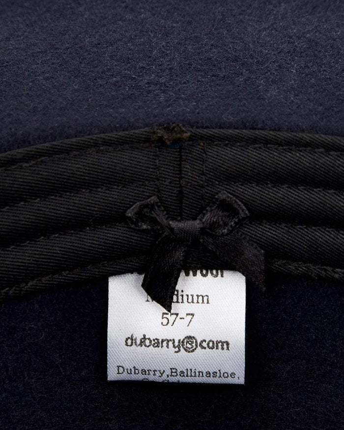 Navy Coloured Dubarry Mens Clonmellon Knitted Beanie on white background #colour_navy