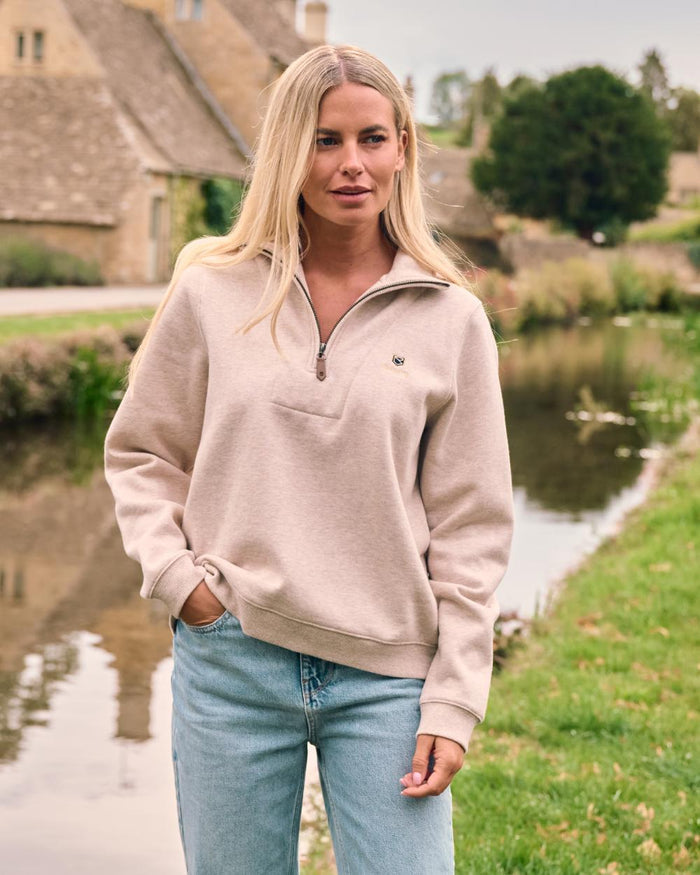 Bone coloured Dubarry Womens Castlemartyr Quarter Zip Sweatshirt on backyard background #colour_bone