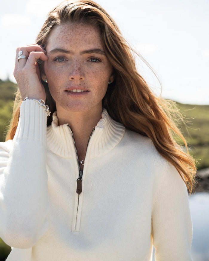 Chalk Coloured Dubarry Womens Markham Zip Neck Sweater on outdoor background #colour_chalk