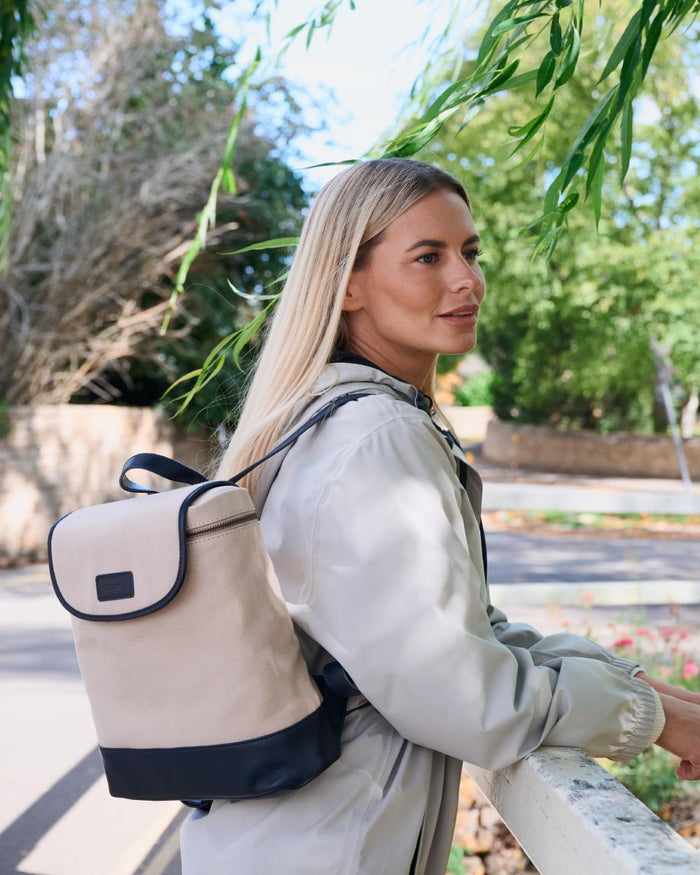 Navy coloured Dubarry Womens Rosegreen Canvas Backpack on park background #colour_navy