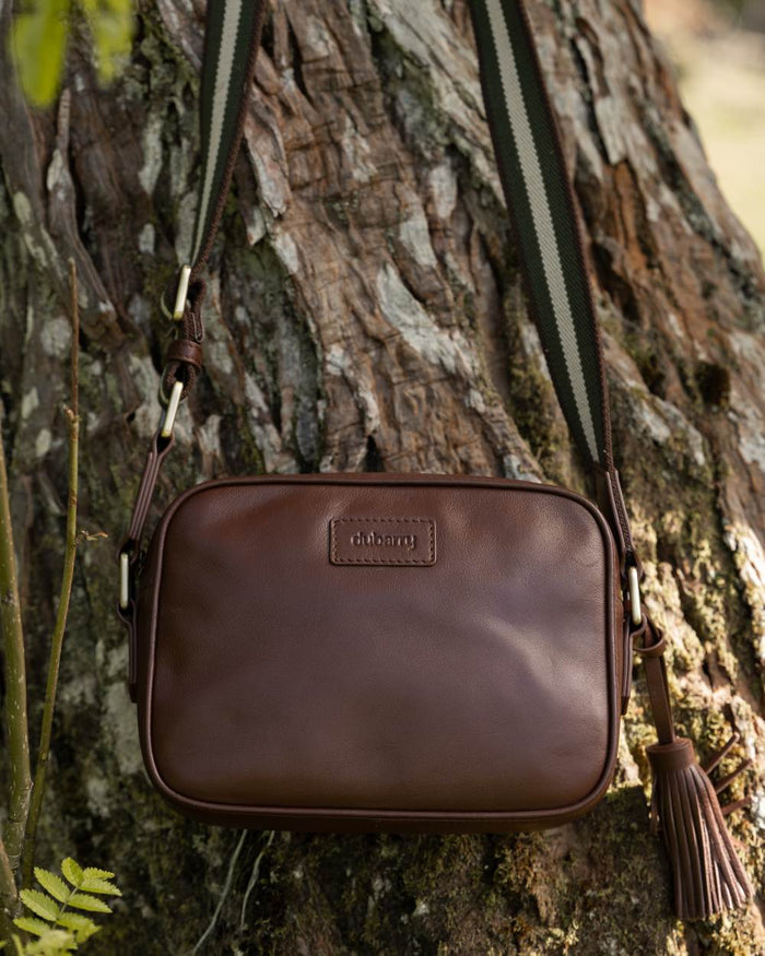 Cedar Coloured Dubarry Womens Rostrevor Cross Body Bag on outdoor background #colour_cedar