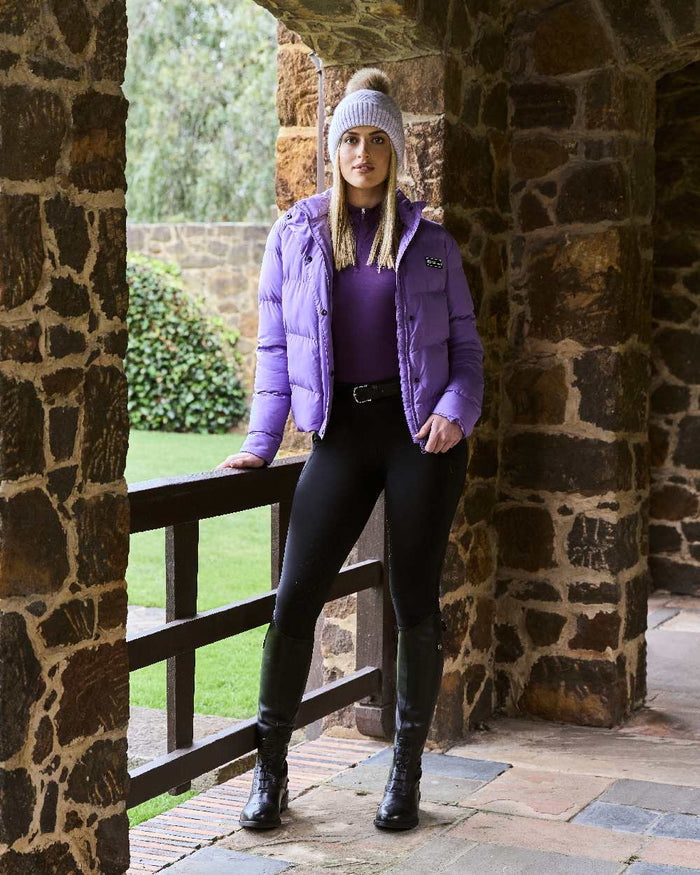 Purple Marle coloured Dublin Bea Beanie on stone wall background #colour_purple-marle