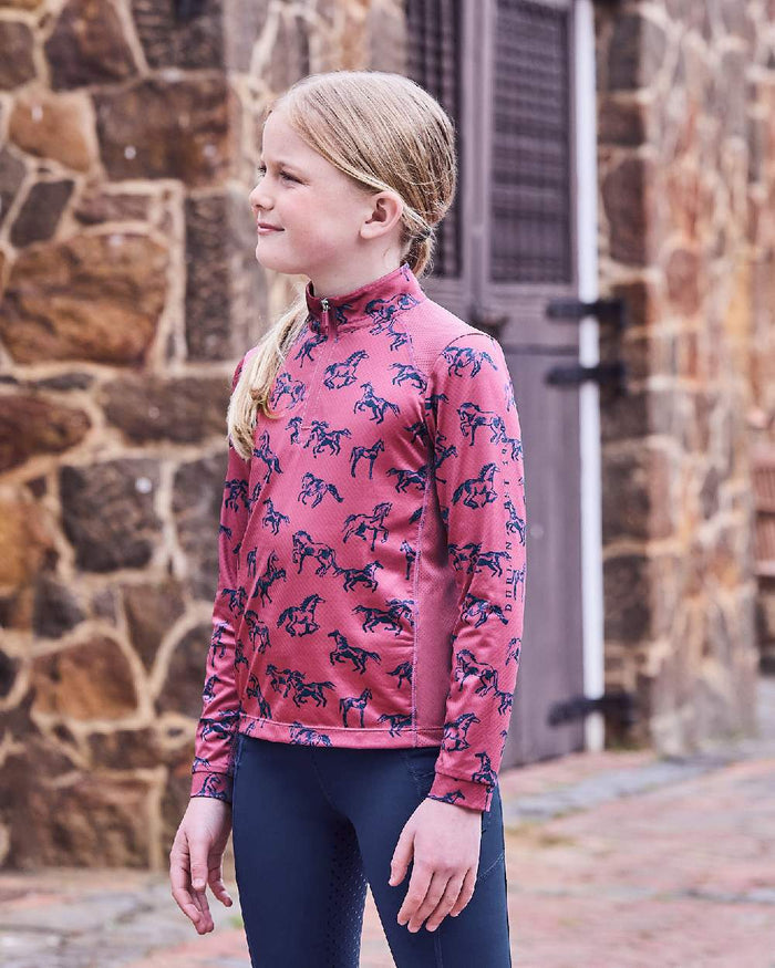 Red Violet Frolicking Horses coloured Dublin Childrens Autumn Sally Long Sleeve Riding Top on street background #colour_red-violet-frolicking-horses