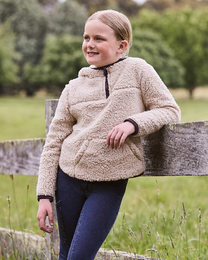 Natural Plum Perfect Trim coloured Dublin Childrens Talia Teddy Pullover on barn background #colour_natural-plum-perfect-trim