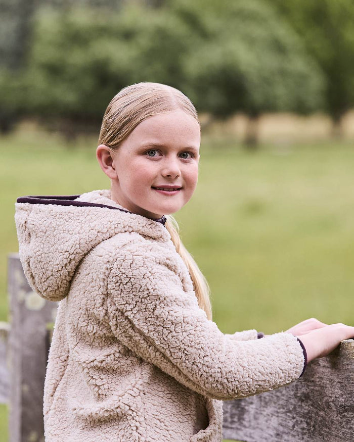 Natural Plum Perfect Trim coloured Dublin Childrens Talia Teddy Pullover on barn background #colour_natural-plum-perfect-trim