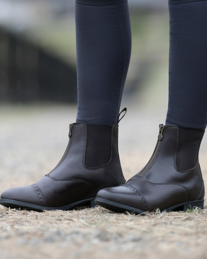Brown Coloured Dublin Foundation Zip Paddock Boots II on street background #colour_brown