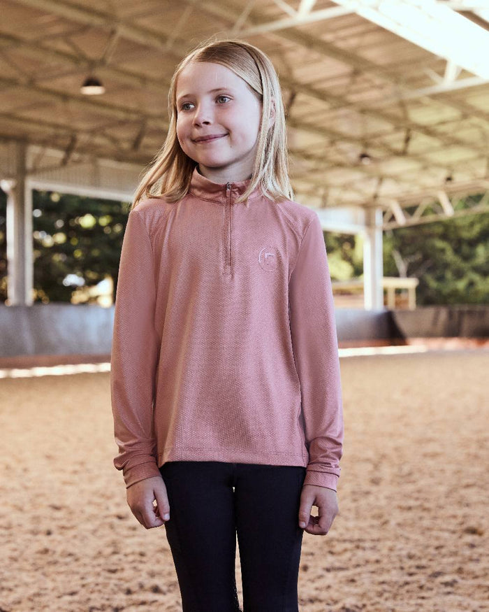 Dusty Rose coloured Dublin Kids Breathable Long Sleeve Riding Top on   sand background #colour_dusty-rose