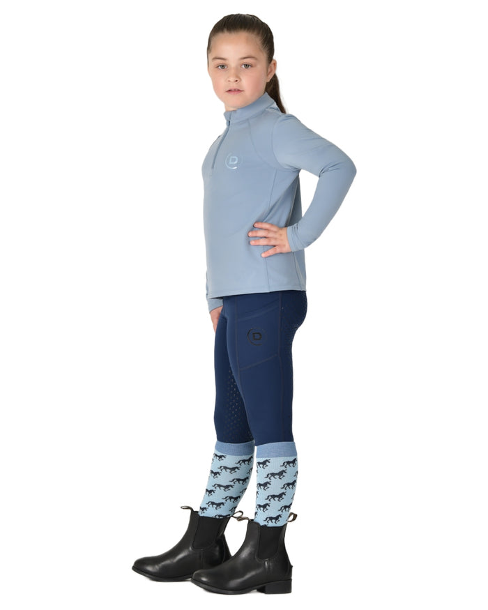 Blue Fog coloured Dublin Kids Brushed Long Sleeve Riding Top on white background #colour_blue-fog