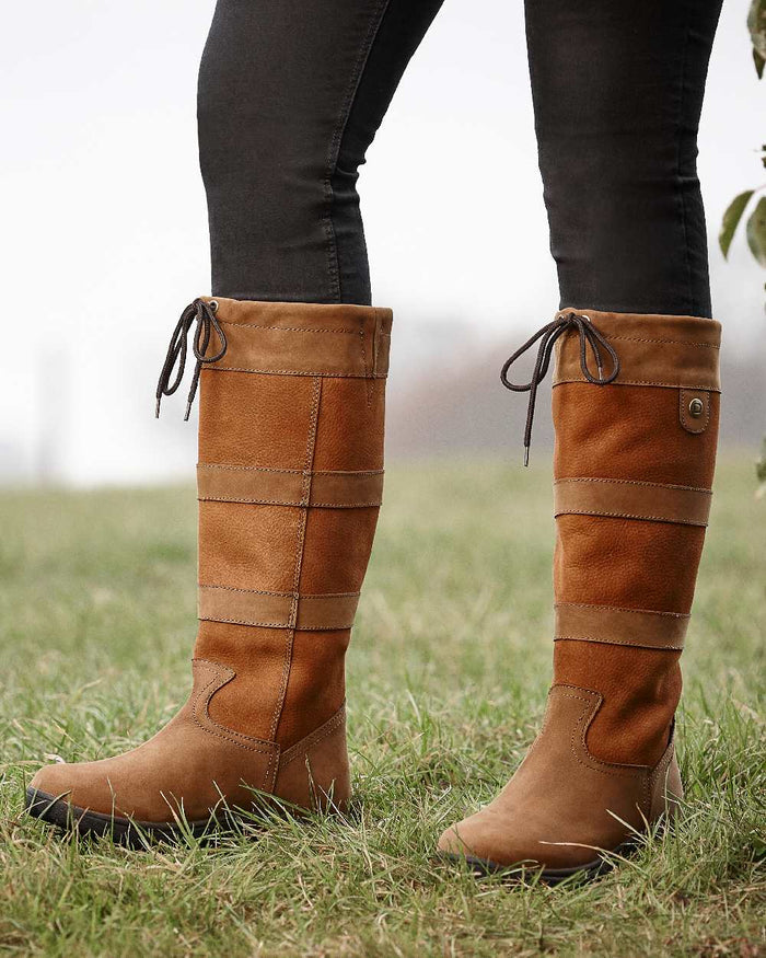 Dark Brown coloured Dublin River Boots III on grassy background #colour_dark-brown
