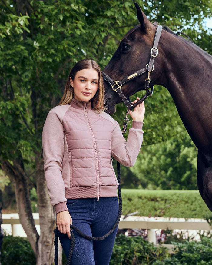 Dusty Rose coloured Dublin Womens Insulated Hybrid Jacket on horse background #colour_dusty-rose