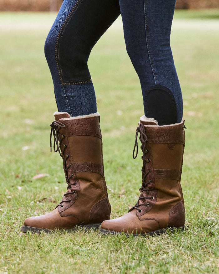 Brown Coloured Dublin Yukon Boots on land background #colour_brown
