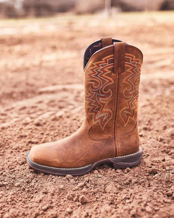Russet Coloured Durango Mens Rebel Waterproof Western Boots on Outdoor Background
#colour_russet