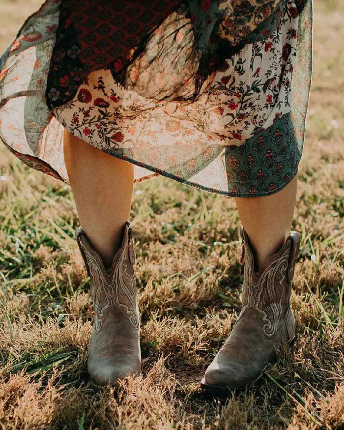 Driftwood coloured Durango Crush Shortie Boots on forest background #colour_driftwood