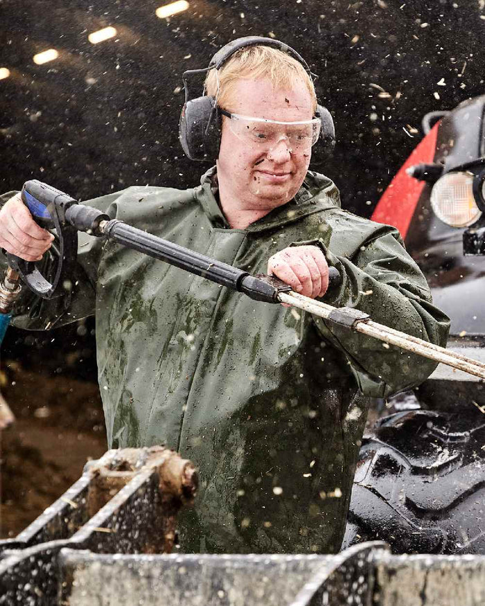 Olive Coloured Elka Light Jacket on construction background #colour_olive