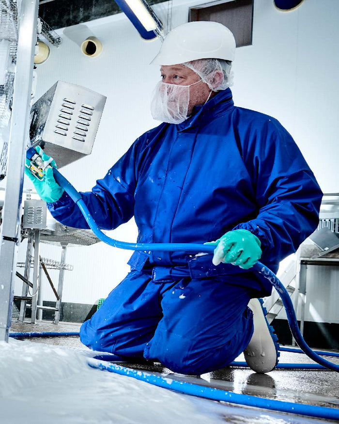 Cobalt Coloured Elka Professional Jacket on construction background #colour_cobalt