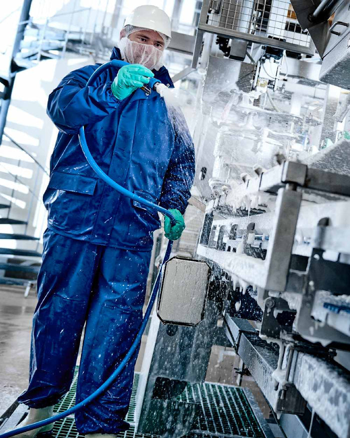 Cobalt Coloured Elka Professional Jacket on construction background #colour_cobalt
