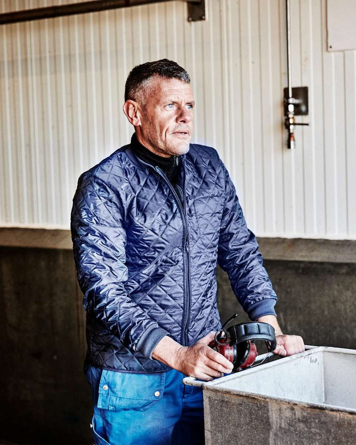 Navy Coloured Elka Mens Thermal Jacket on shelter background #colour_navy
