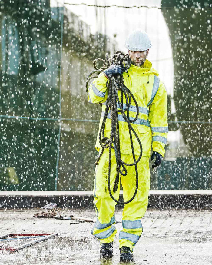 Fluorescent Yellow Coloured Elka Mens Visible Xtreme Rain Trousers With Reflective Tape on rain background #colour_fluorescent-yellow