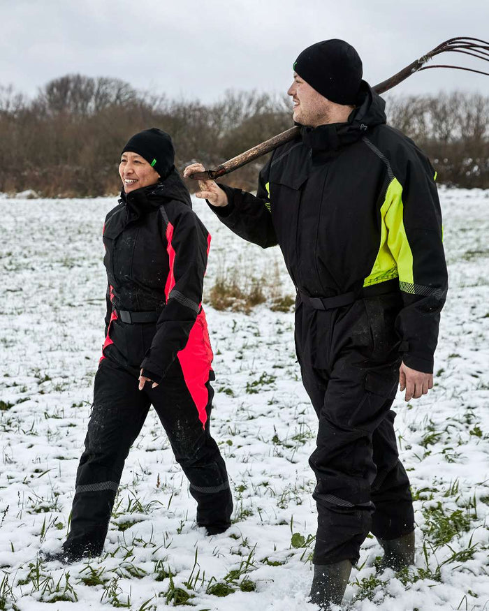 Black Red Coloured Elka Womens Working Xtreme Winter Thermal Coverall With Recycled Padding on snow background #colour_black-red