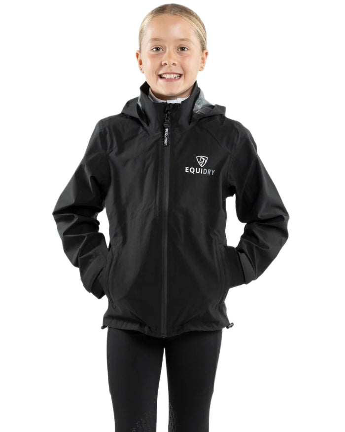 Black coloured Equidry Childrens Nimbus Pack Away Jacket With Stowaway Hood on white background #colour_black