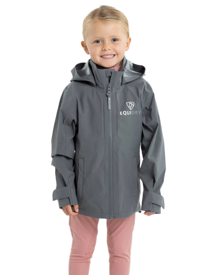 Charcoal coloured Equidry Childrens Nimbus Pack Away Jacket With Stowaway Hood on white background #colour_charcoal