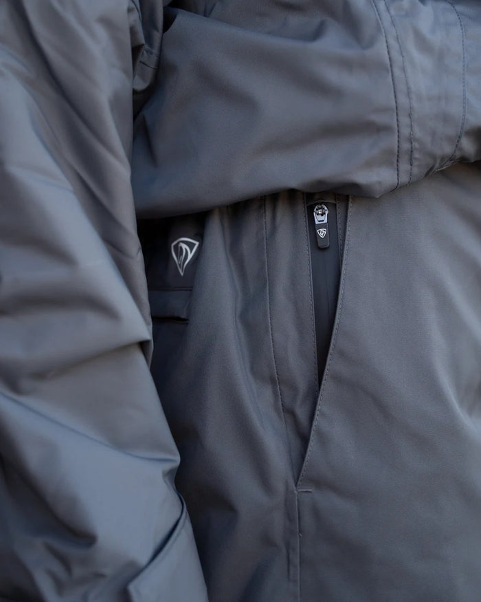 Black coloured Equidry Mens Fleece Lined Waterproof Trousers on outdoor background #colour_black
