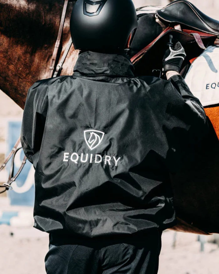 Black coloured Equidry Mens Thin Fleece Shortie Jacket With Stowaway Hood on outdoor background #colour_black
