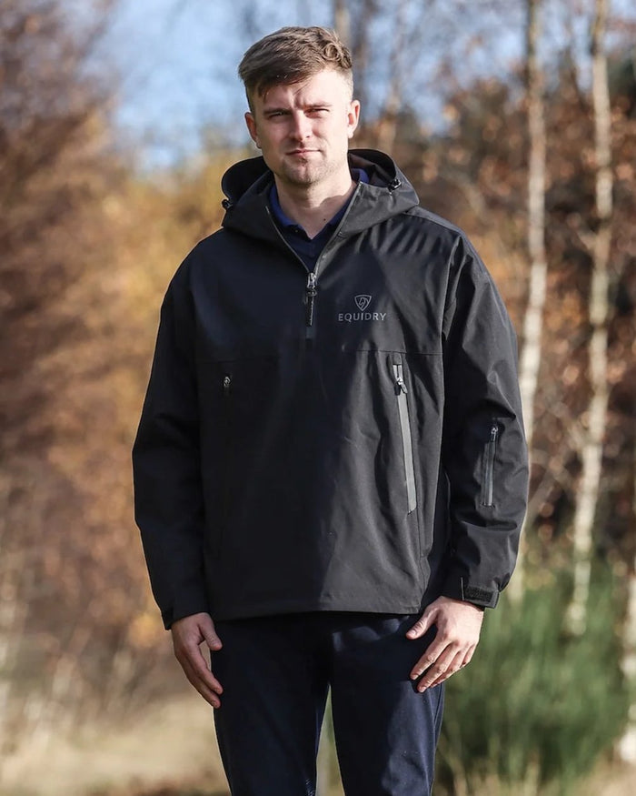 Black coloured Equidry Mens Storm Smock With Velour Lining on outdoor background #colour_black