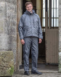 Charcoal coloured Equidry Mens Unlined Waterproof Trousers on outdoor background #colour_charcoal