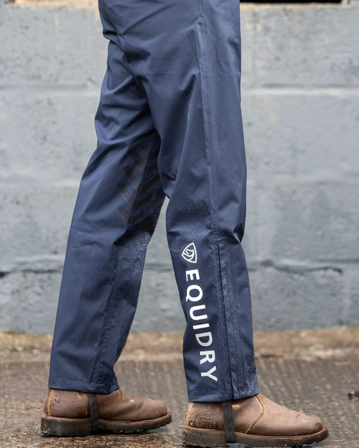 Navy coloured Equidry Mens Unlined Waterproof Trousers on outdoor background #colour_navy