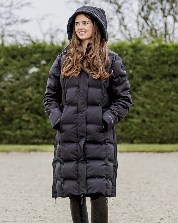 Black coloured Equidry Thora Waterproof Riding Puffer Coat With Hood on outdoor background #colour_black