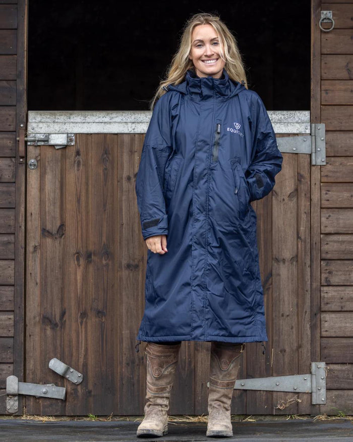 Navy coloured Equidry Womens Pro Ride Evolution Thin Fleece Coat With Stowaway Hood on outdoor background #colour_navy