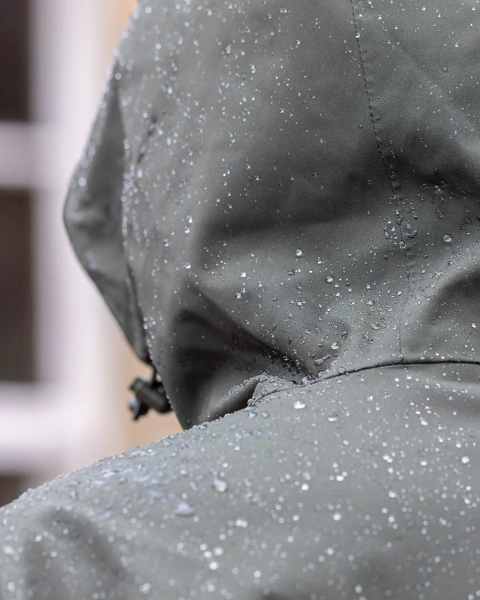 Black Forest Green coloured Equidry Womens Storm Smock With Velour Lining on outdoor background #colour_black-forest-green