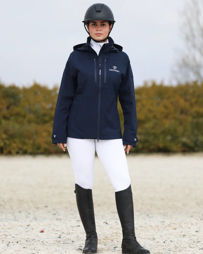 Navy coloured Equidry Womens Varsha Jacket with Stowaway Hood on sand background #colour_navy